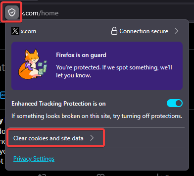 Firefox address bar with shield icon and Clear cookies and site data button highlighted